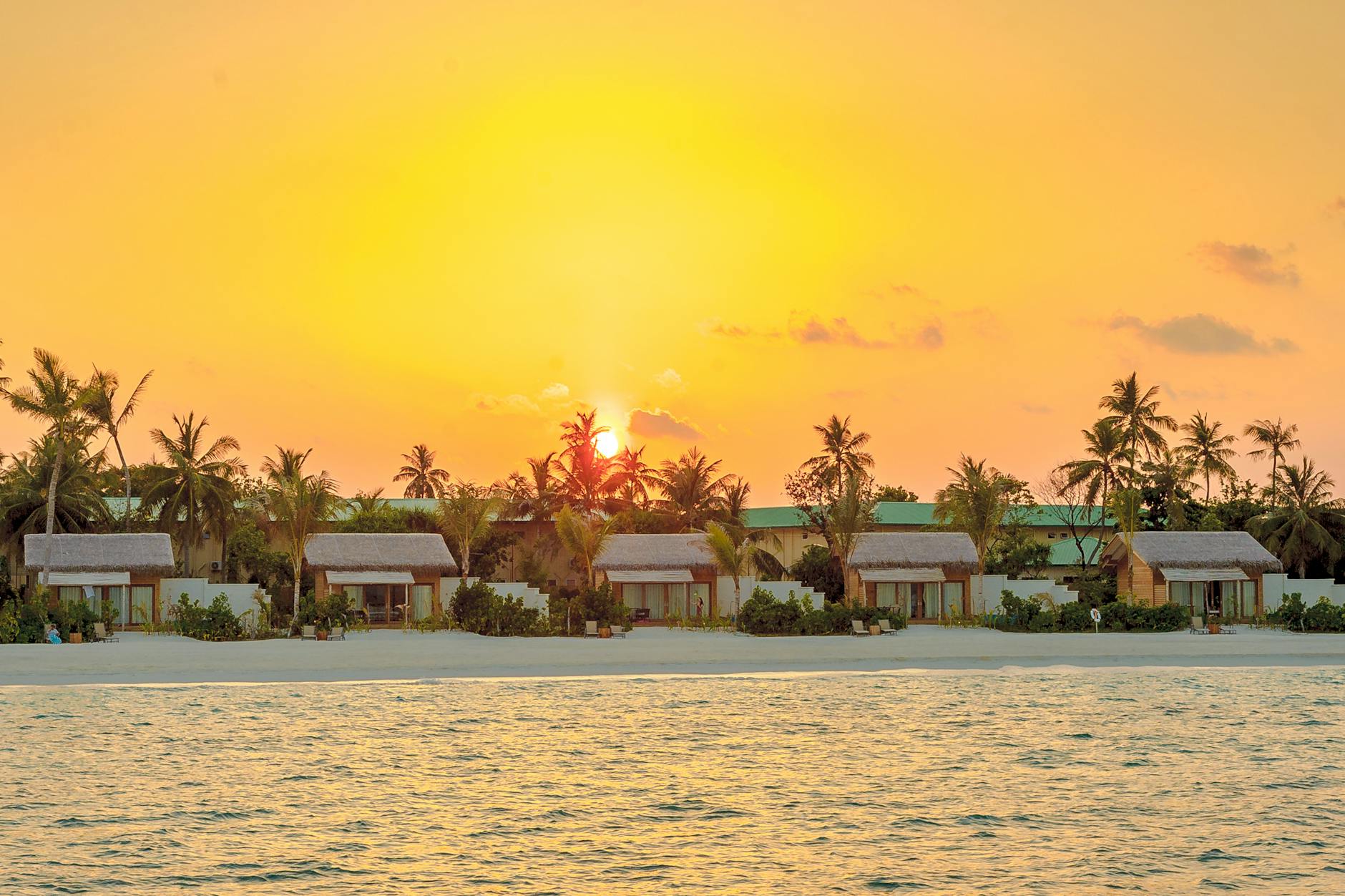scenic maldives beach resort sunset