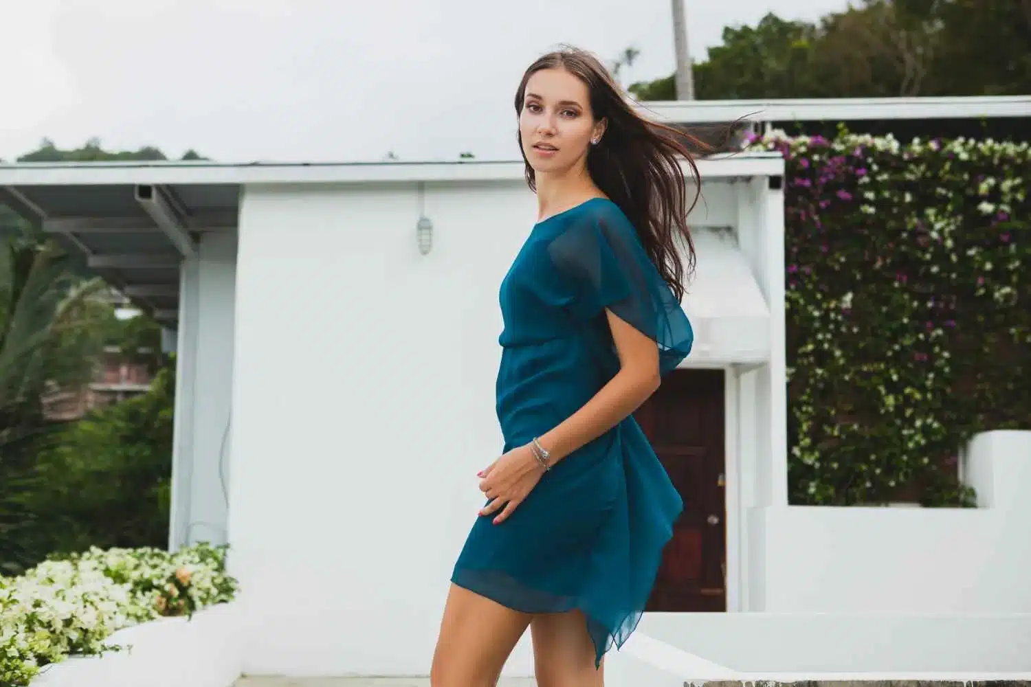women wearing blue mini dress