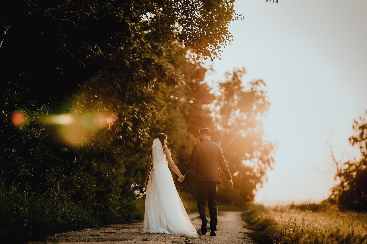 Couples holding hands while walking