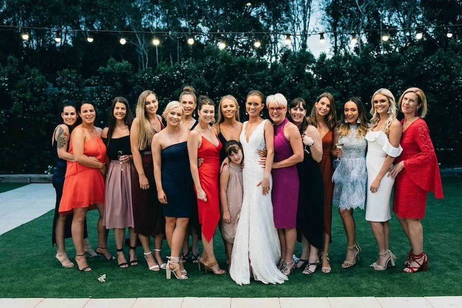 Women in wedding getting photograph clicked