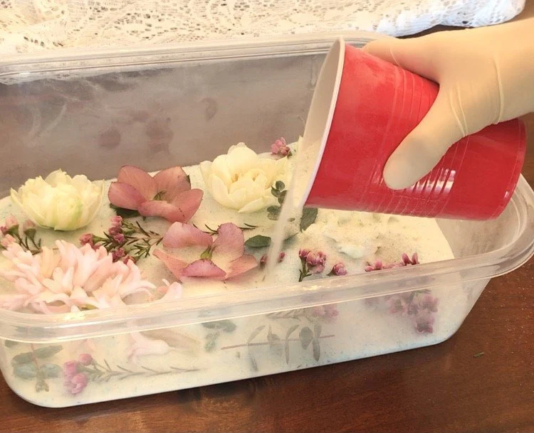Silica gel packets scattered around colorful wedding reception decorations, helping preserve flowers and other décor elements while maintaining a budget-friendly setup.