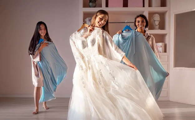 Women trying wedding outfit