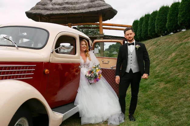 couples in wedding car celebration