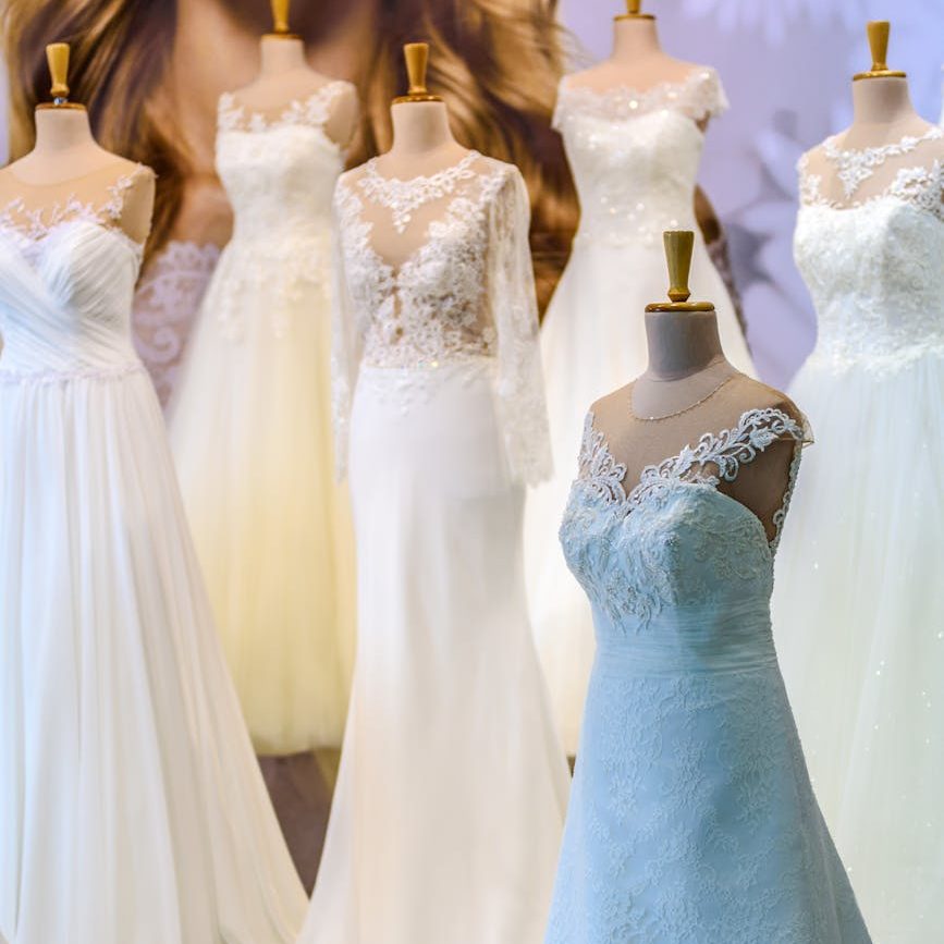 several sleeveless dresses